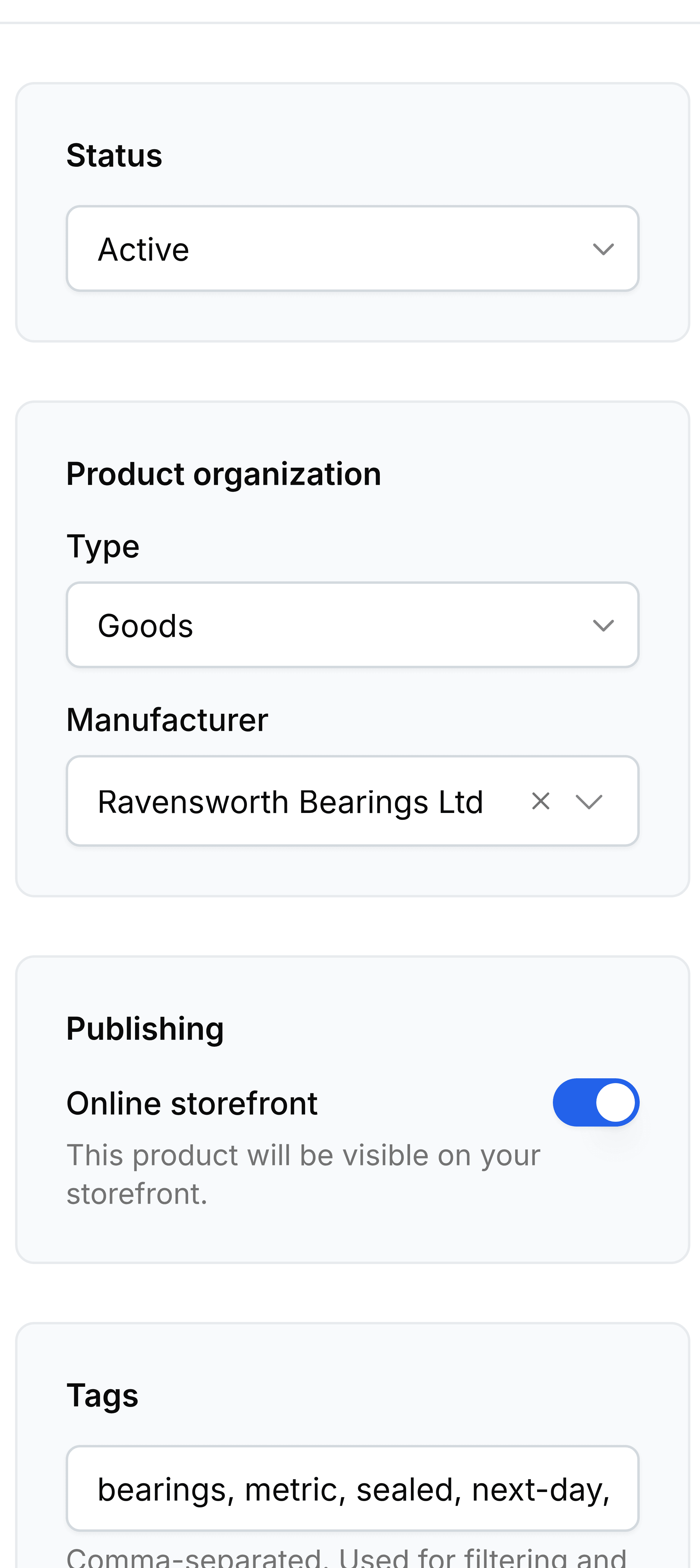 The right-hand column of a product, showing four cards. Status reads Active. Product organization gives Type as Goods and Manufacturer as Ravensworth Bearings Ltd. Publishing holds the Online storefront switch, turned on, with the note This product will be visible on your storefront. Tags lists bearings, metric, sealed, next-day and stock-line as chips.