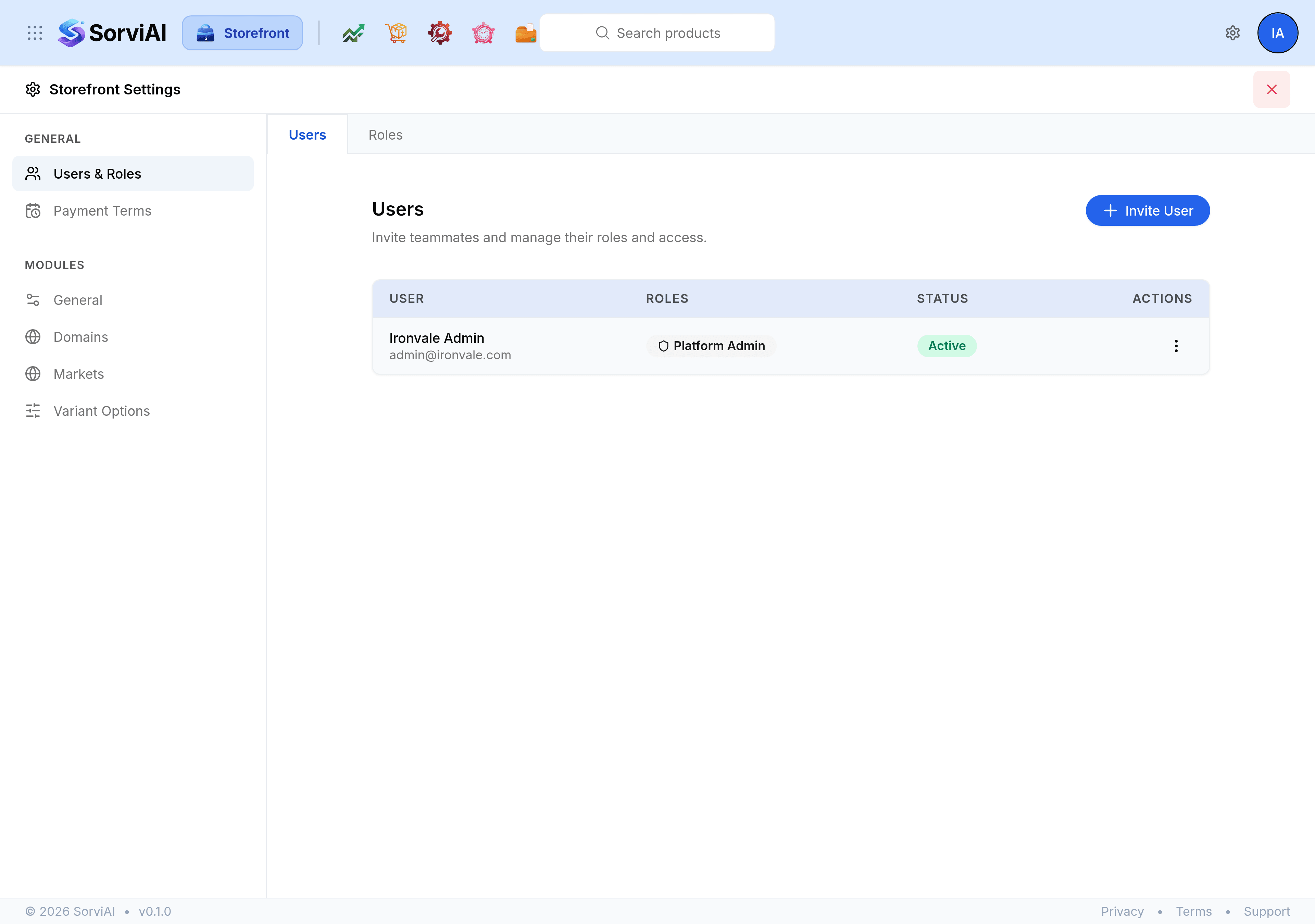 The Roles tab of Users & Roles, headed Roles with the note Define roles and the permissions granted to users assigned to them. The table gives each role its name, its Scope, a description and an actions menu, with system roles marked with a System badge.
