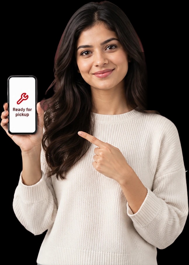 A smiling woman in a cream sweater pointing at her phone, which shows her repair is ready for pickup.