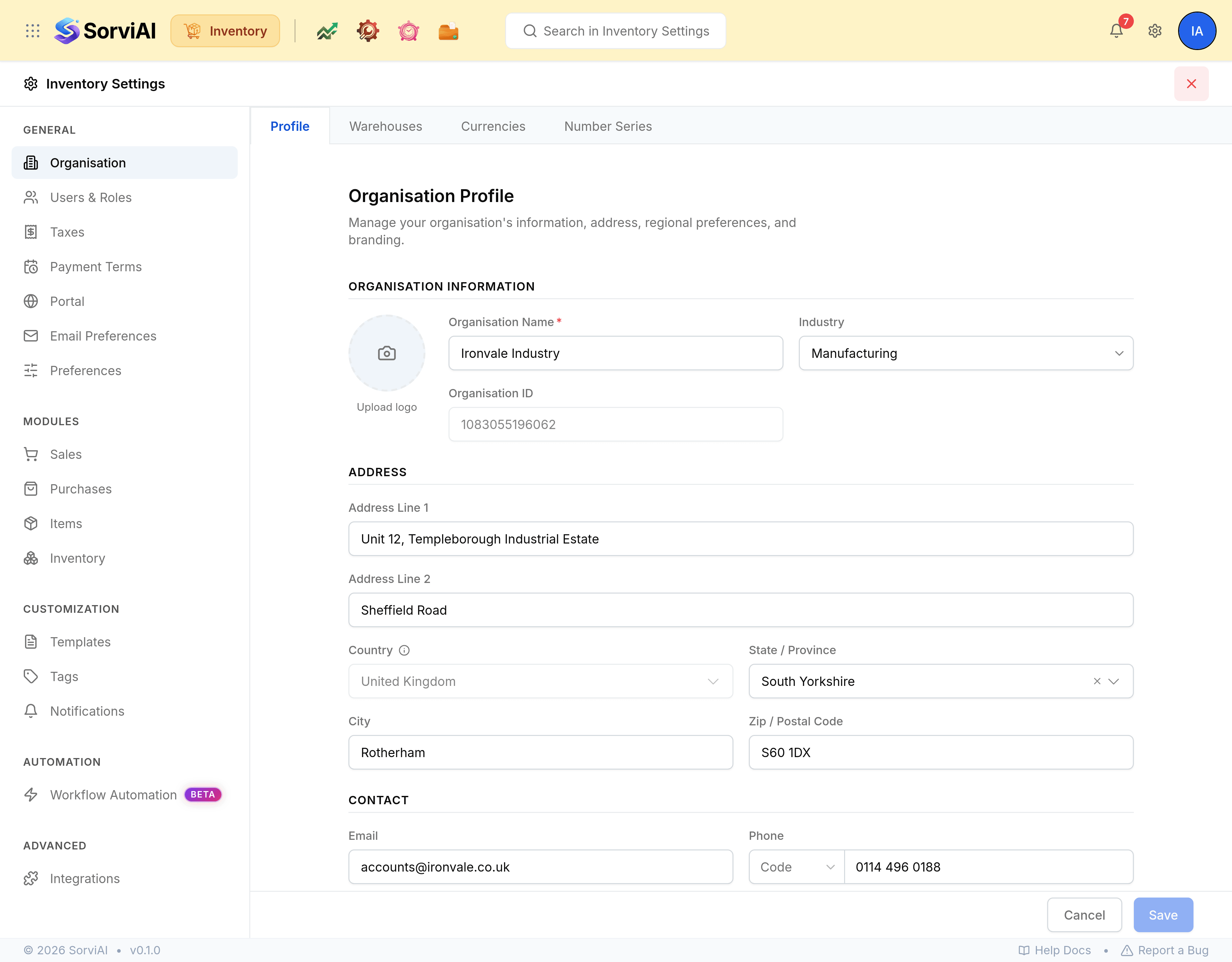 Inventory Settings with a left menu grouped under General holding Organisation, Users and Roles, Taxes, Payment Terms, Portal, Email Preferences and Preferences, then Modules holding Sales, Purchases, Items and Inventory, then Customization, Automation and Advanced. Organisation is selected and shows tabs reading Profile, Warehouses, Currencies and Number Series. The Profile tab holds an Upload logo control, an Organisation Name reading Ironvale Industry, an Industry picker, an Organisation ID and address fields with Country set to United Kingdom.